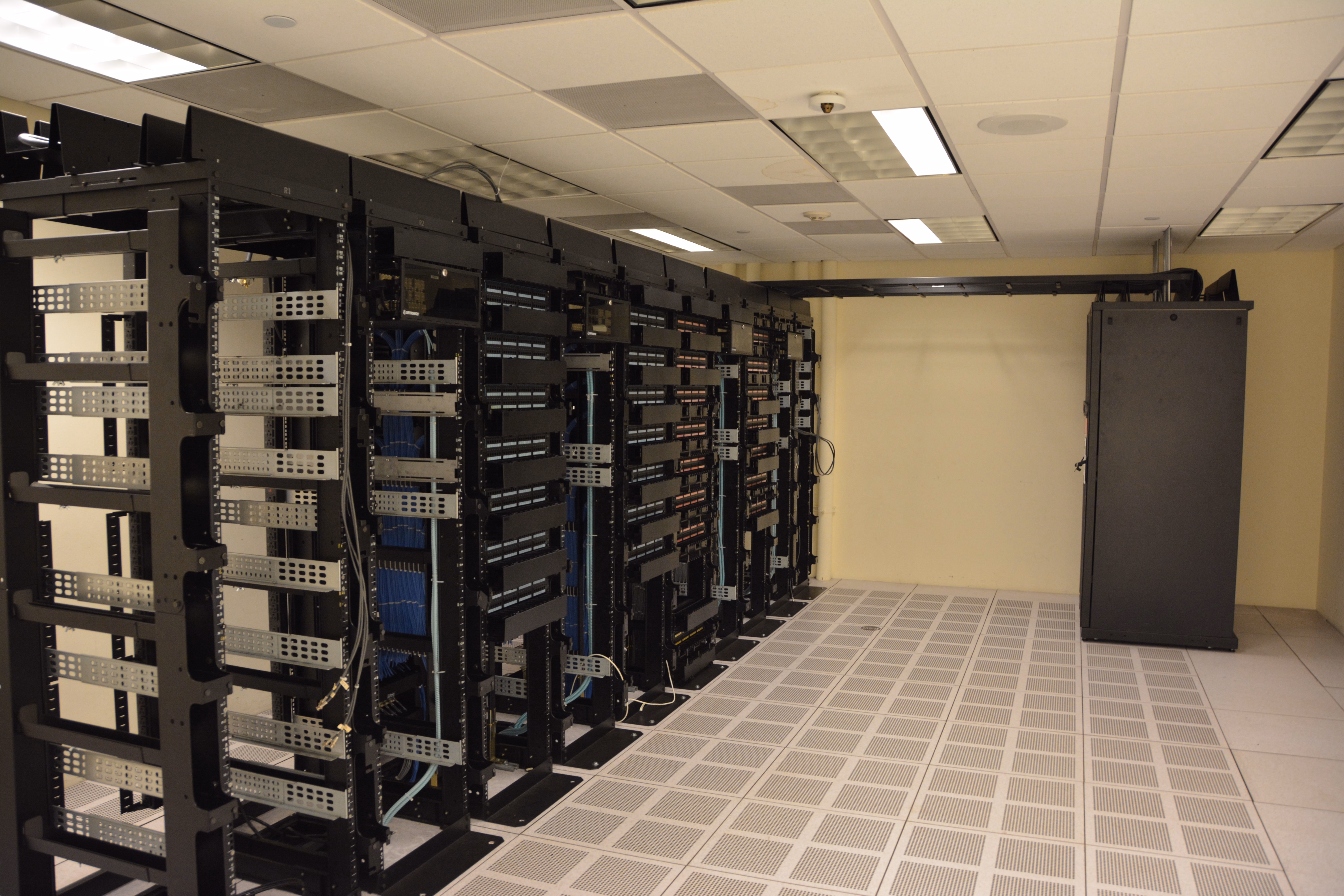 Datacenter server racks illustrating the AI compute demand driving the DRAM contract market