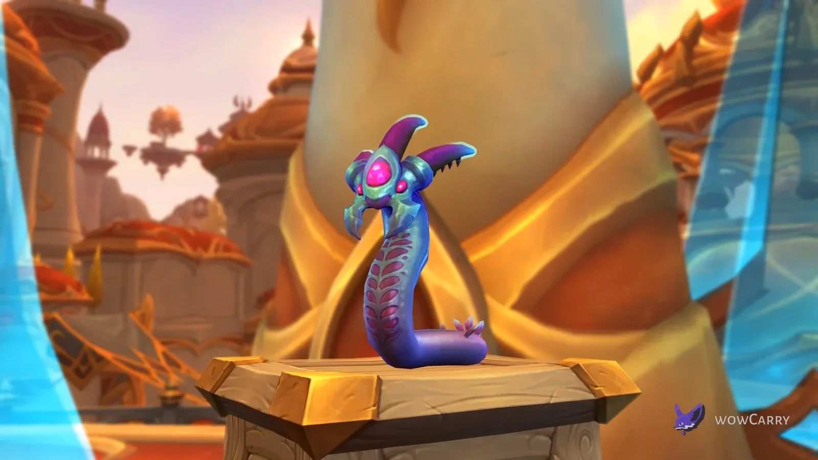 Gummi baubleworm pet with a pink head, purple and blue segments and bright jewel-like markings